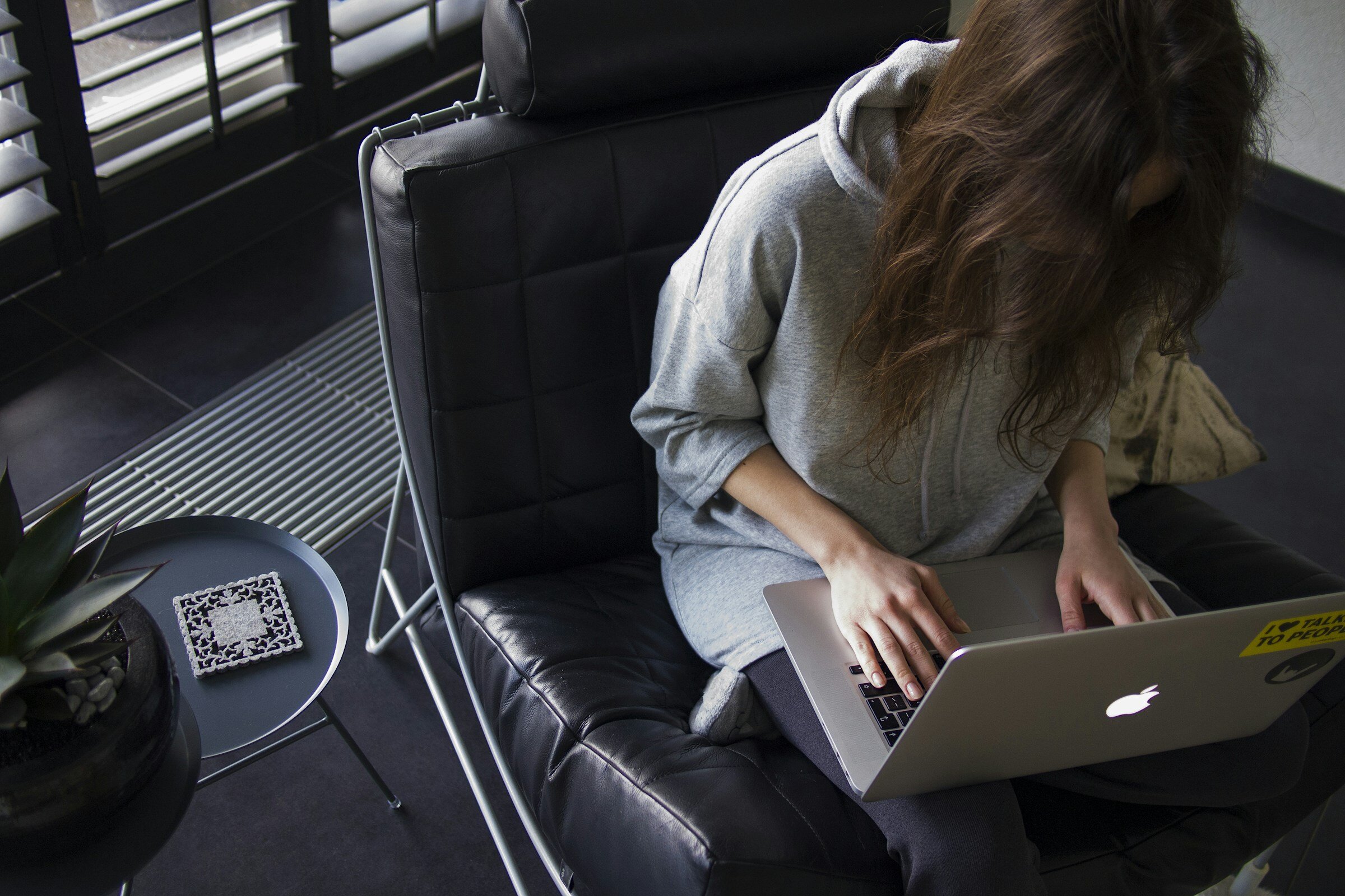 woman sitting on couch - Front End Metrics