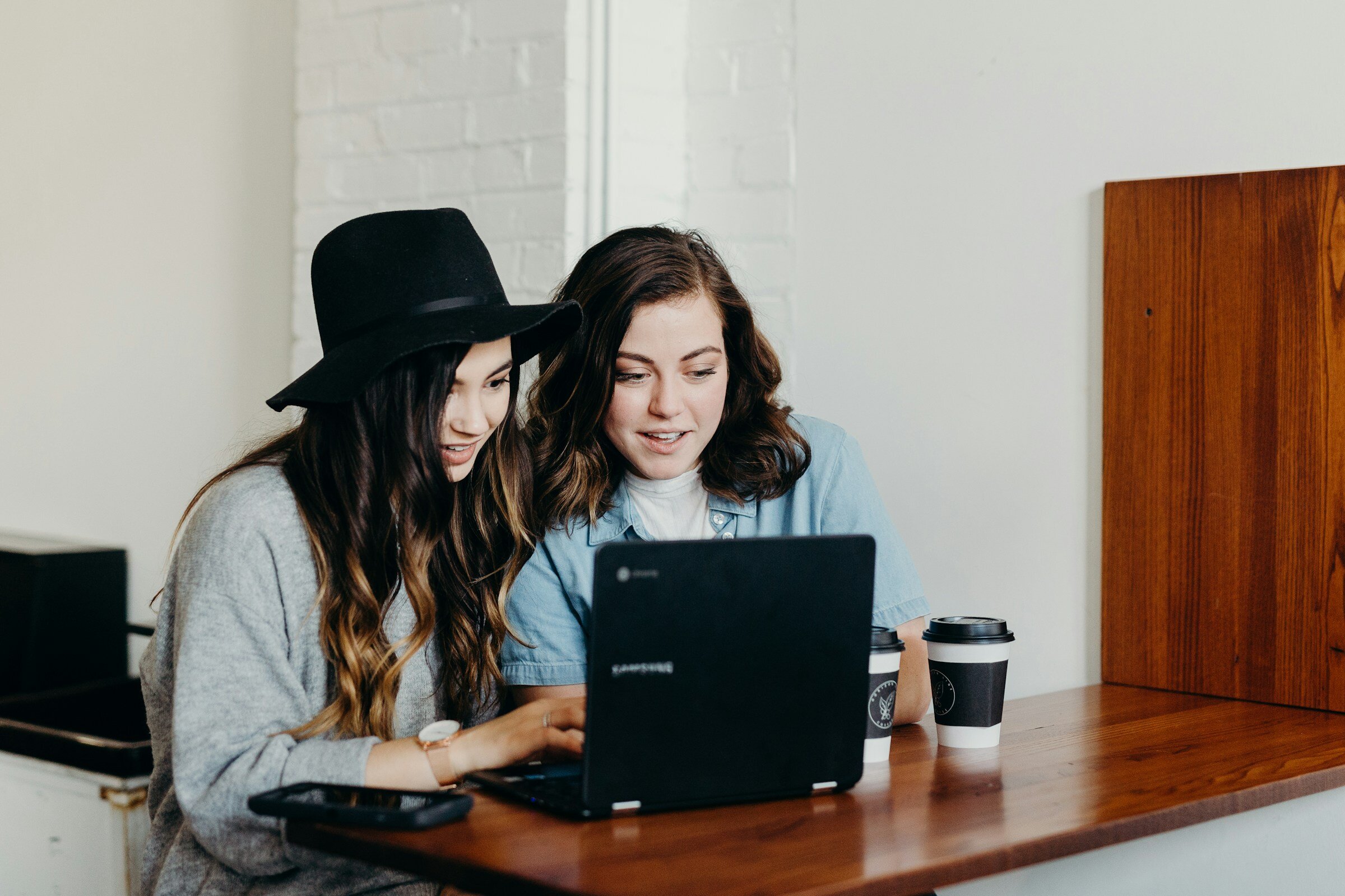 person infront of laptop - Why Monitoring Your Application Is Important