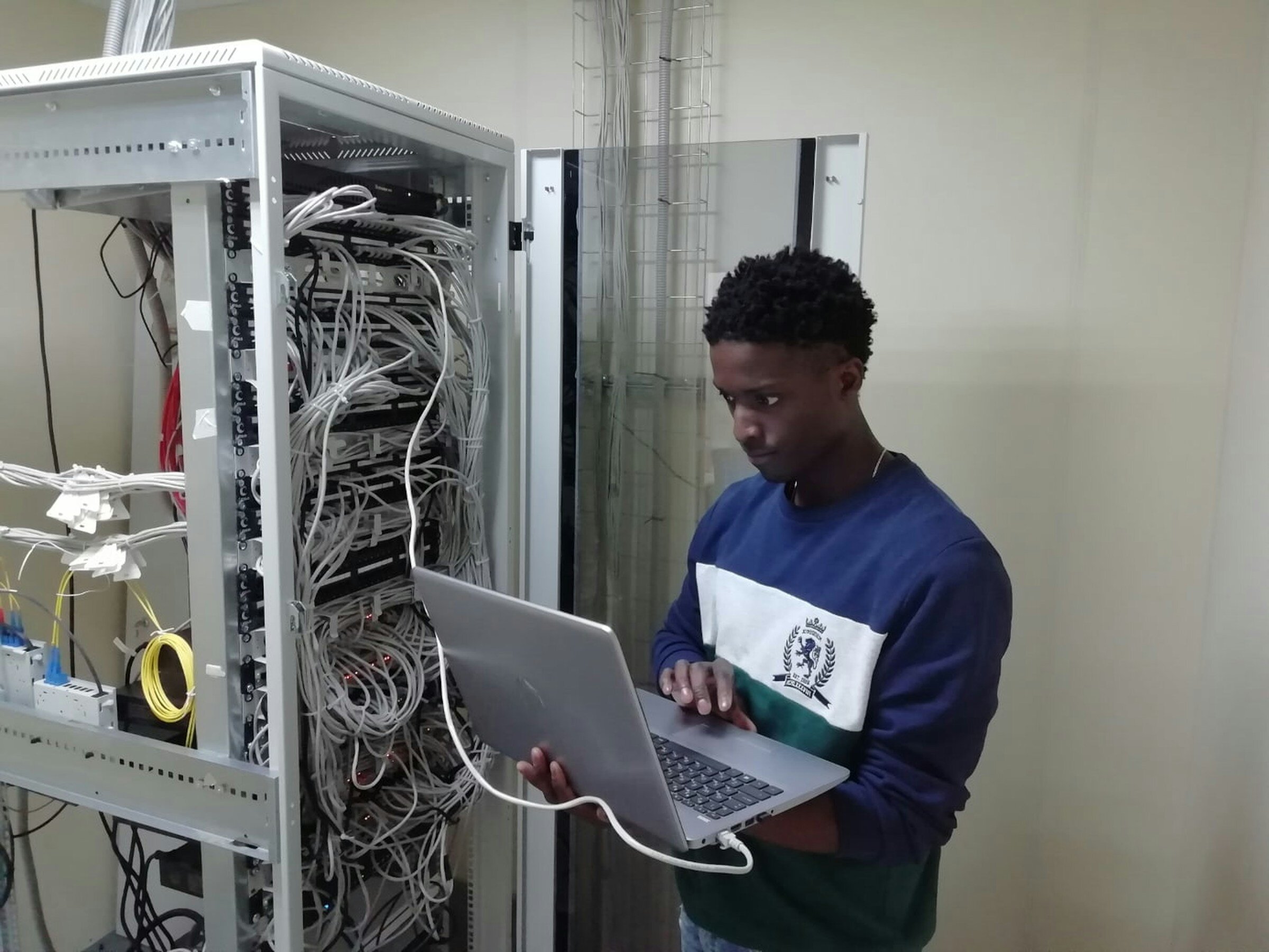 man checking server logs - How To Monitor A Web Server