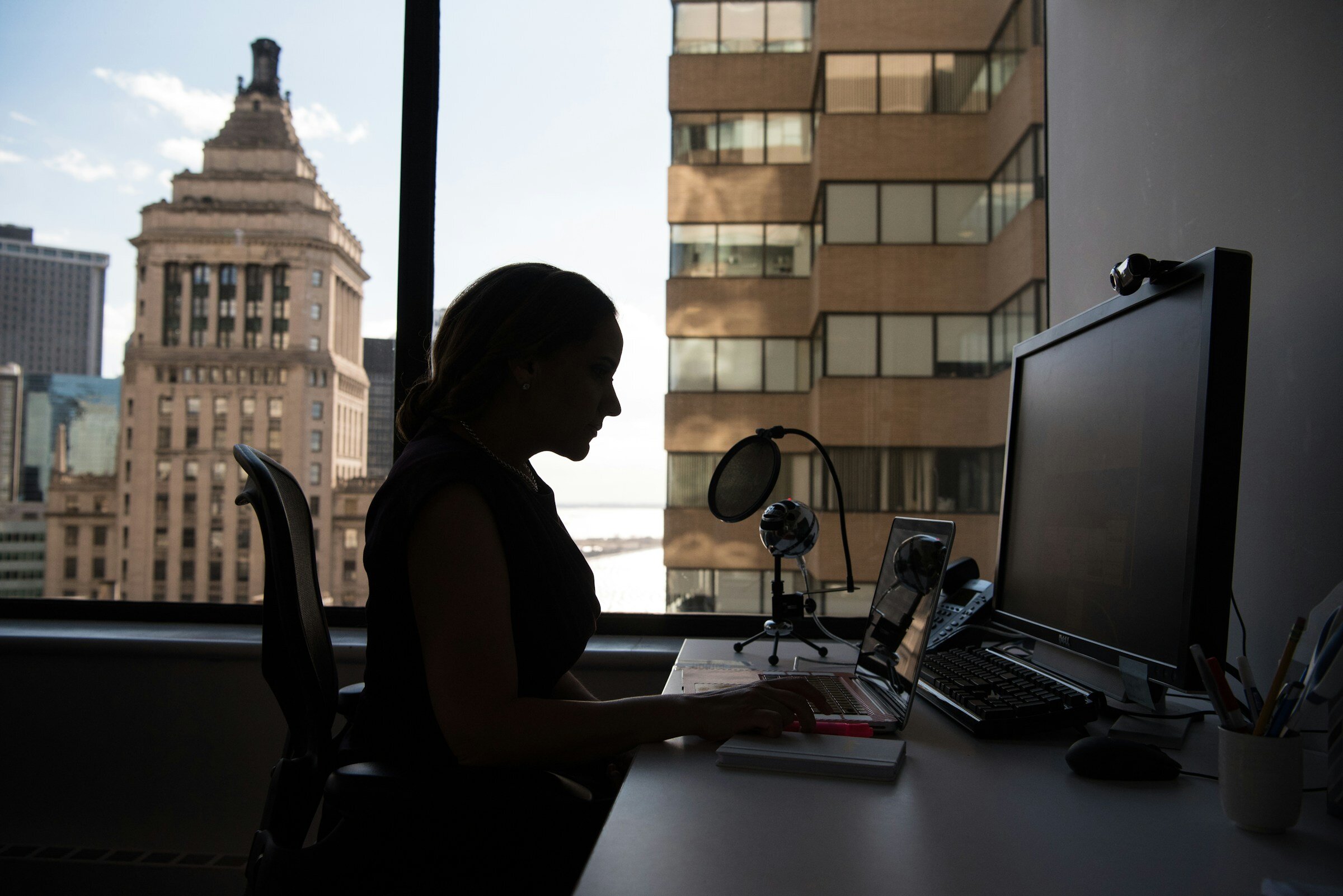 woman checking out cloud servers - How To Monitor A Web Server