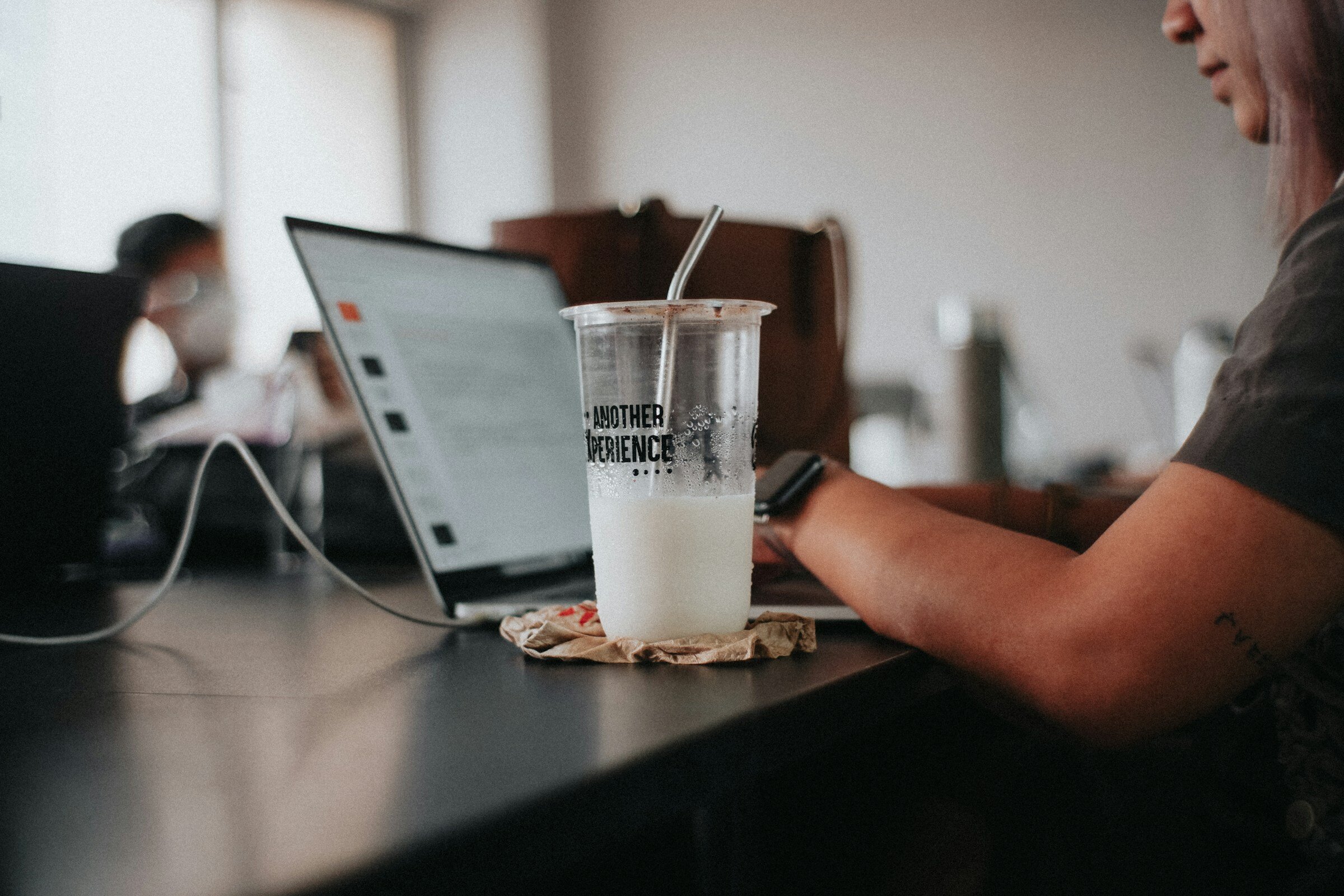 Woman Working in Office - Pingdom Alternatives