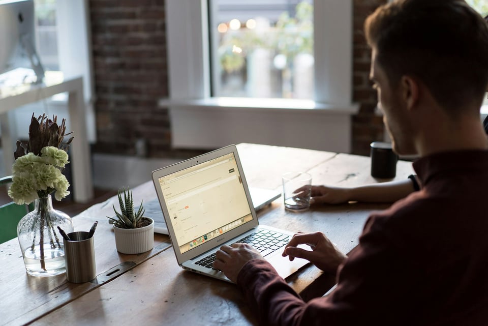 man working with Application Security Monitoring