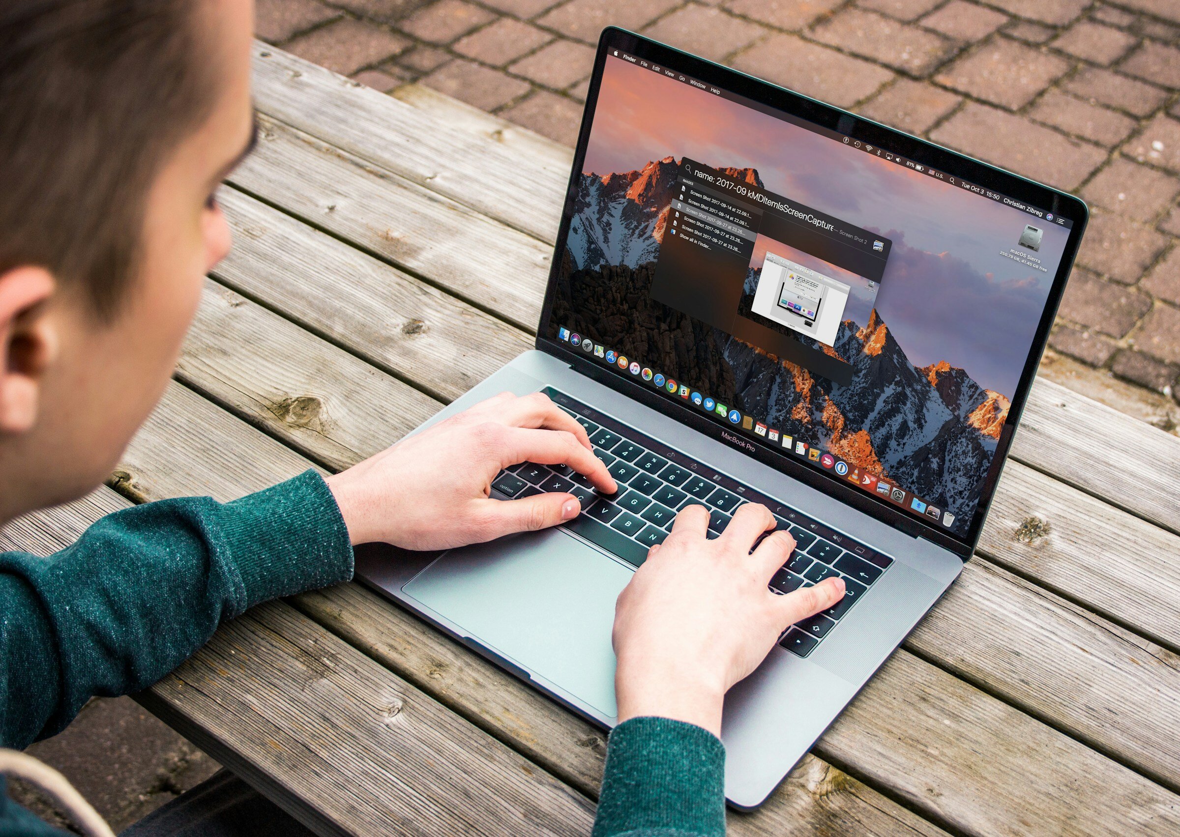 Man Using Google Search on Laptop - Front End Monitoring Tools