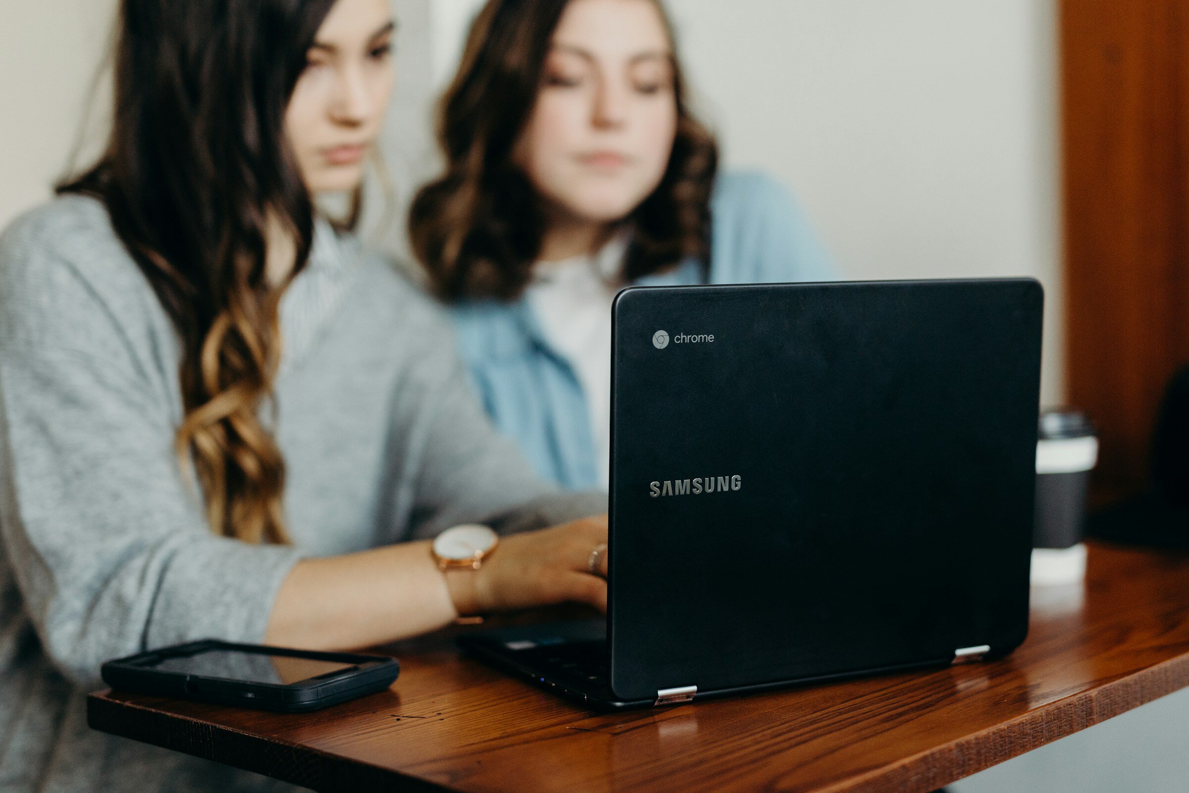 Women Using Laptop - Opentelemetry Alternatives