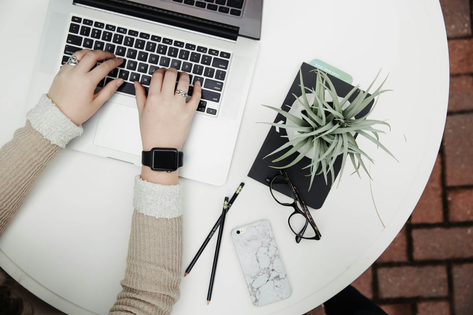 woman working alone on Application Security Monitoring