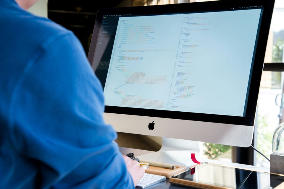 man concentrating on work - Web App Monitoring