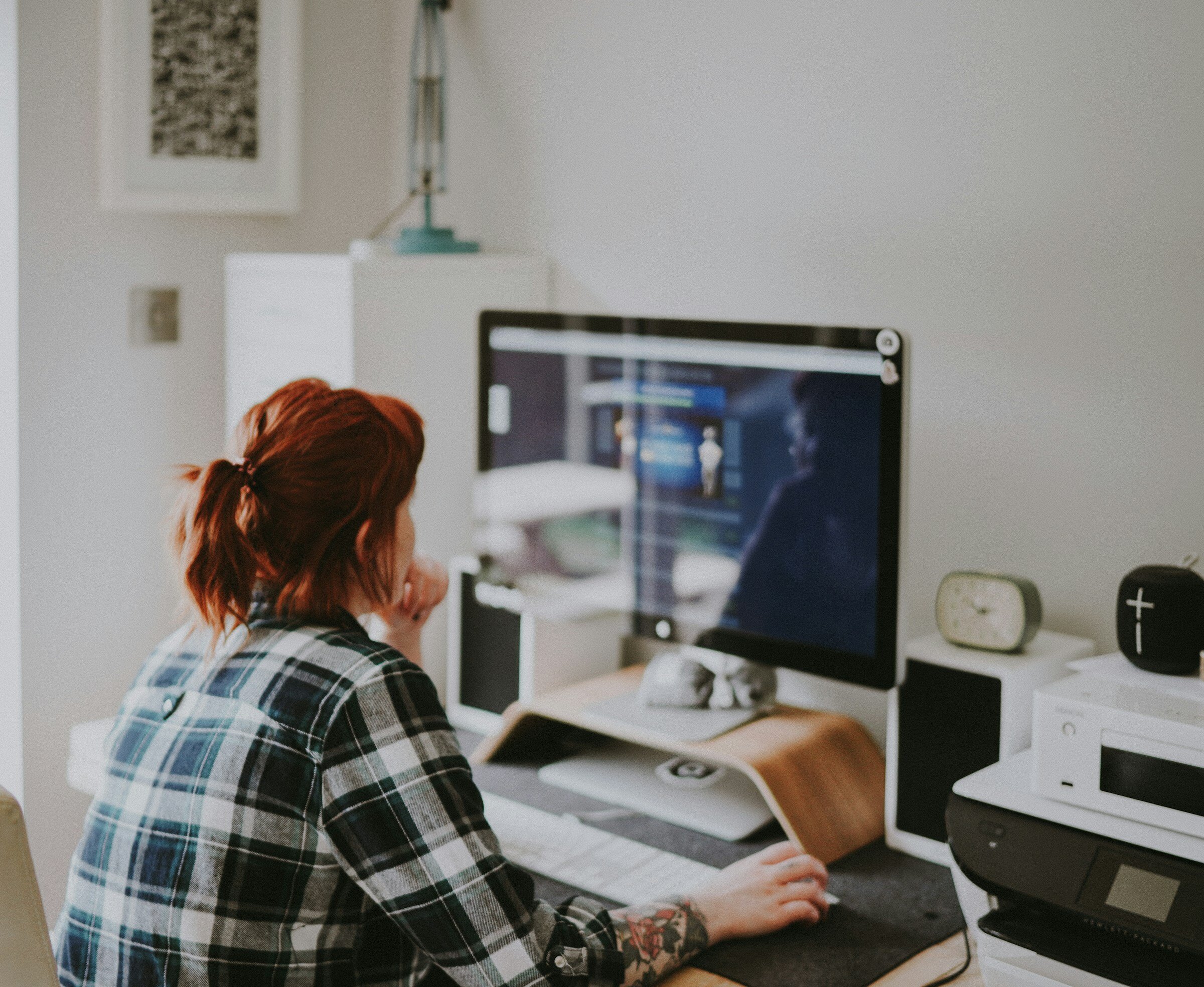 Woman Using Computer - Sentry Pricing