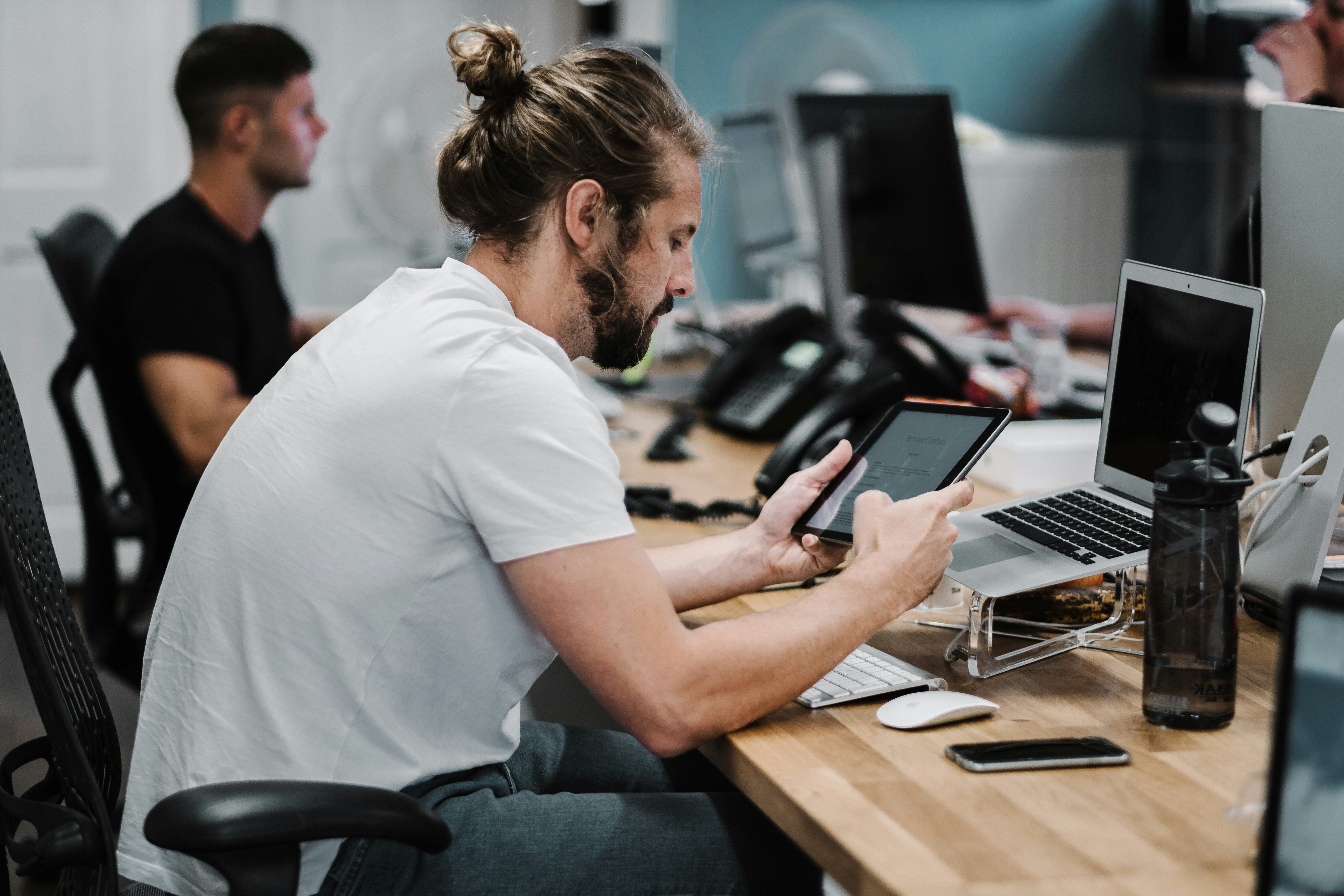 person infront of laptop and testing app performance - Automated Anomaly Detection