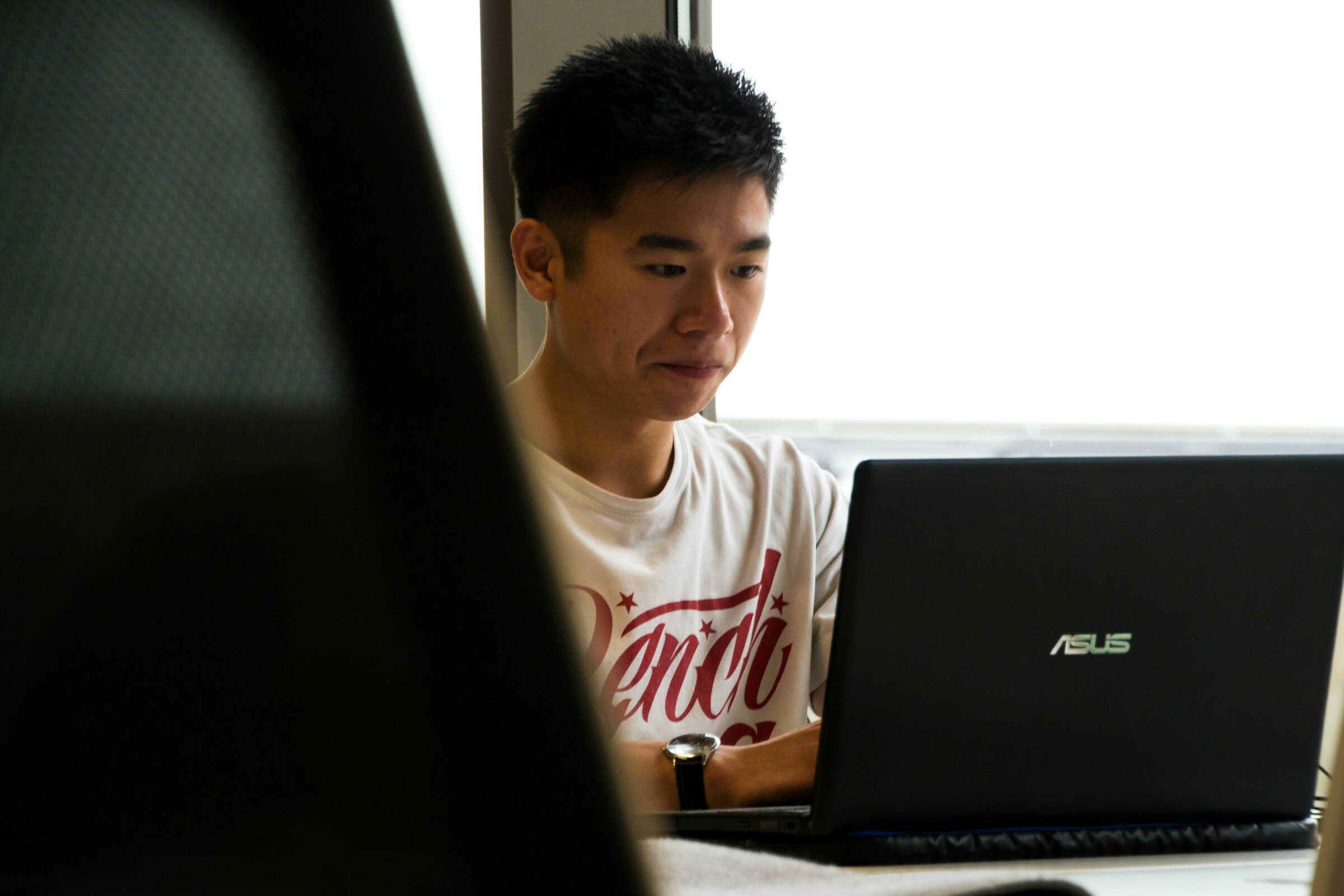 man working hard with Log Monitoring Tools