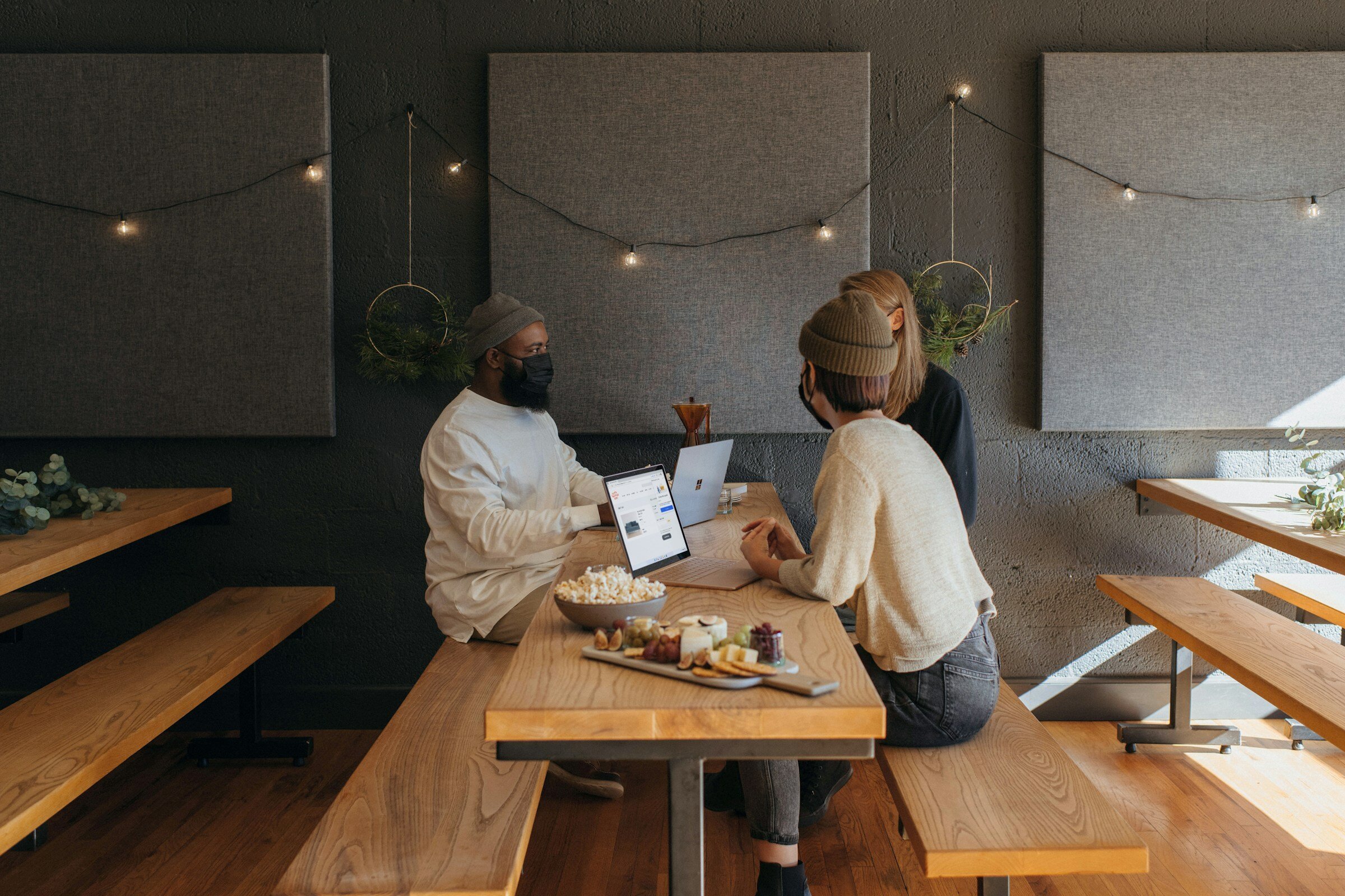 woman with friends in a small meeting - End User Experience Monitoring Tools